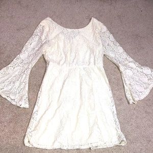 A soft lace dress with flare sleeves
